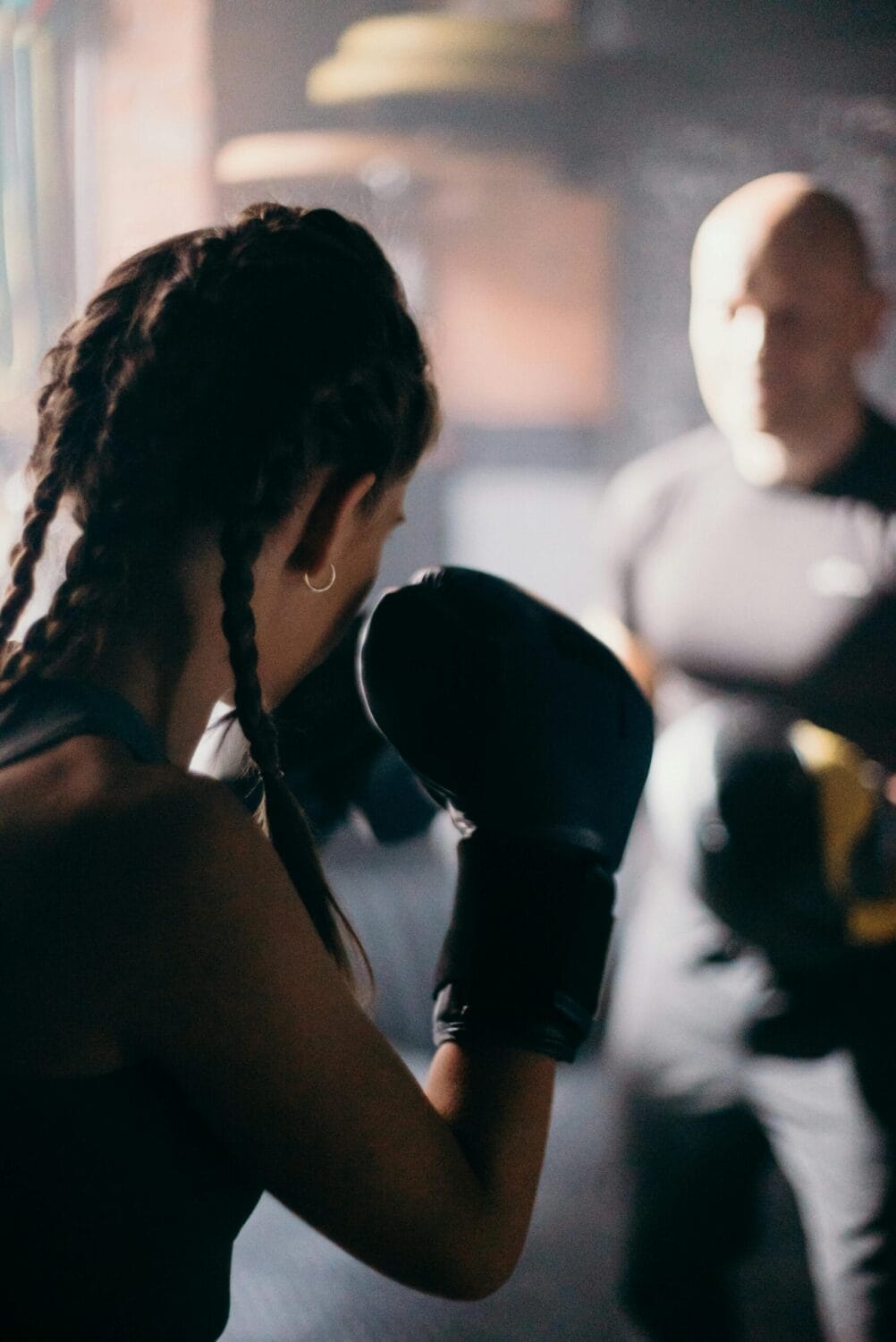 woman in black tank top boxing