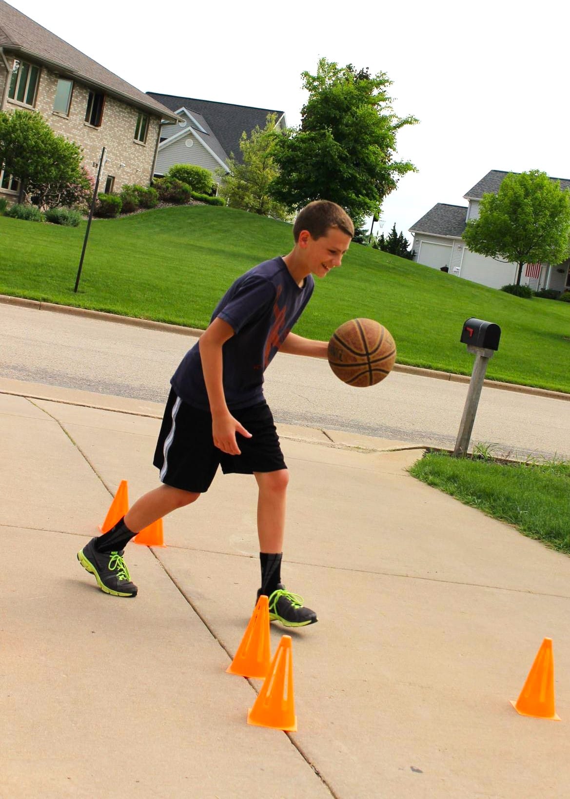 boy working on basketball drills