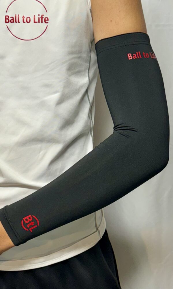 Black arm sleeve red letter on player Ball to Life