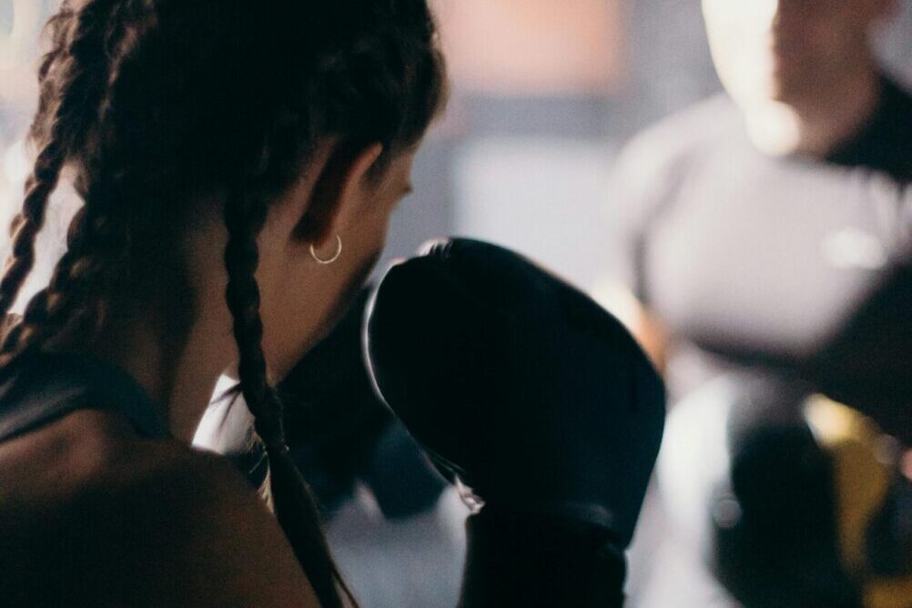 woman in black tank top boxing