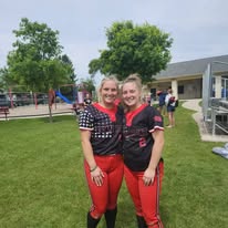 Player Spotlight posing for picture after softball game